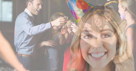 Multiple image of portrait of caucasian young woman wearing hat and friends toasting drinks in party. Enjoyment, alcohol, international youth day, celebration, cultural and legal issues awareness.の写真素材