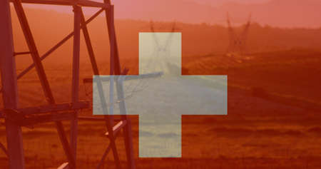 Image of flag of switzerland over pylons. ukraine crisis and international politics concept digitally generated image.の写真素材
