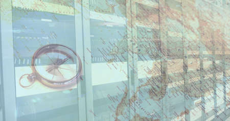 Digital composition of compass and world map against computer server room. computer interface and...