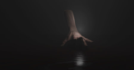 Image of hand walking in dark space. Horror, fright and halloween concept digitally generated image.の写真素材