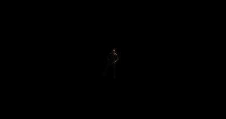Image of distressed shirtless bald figure holding head in pain in dark room. Fear, horror and suffering concept digitally generated image.の写真素材