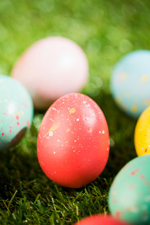 Various Easter eggs on grass in garden