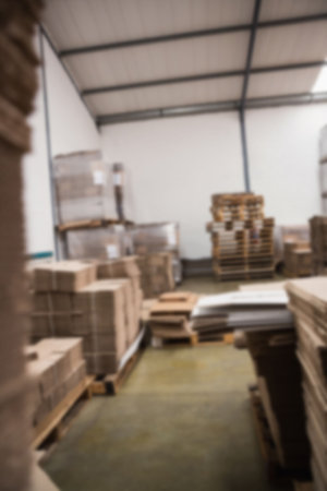 Stack of cardboard boxes in storage room
