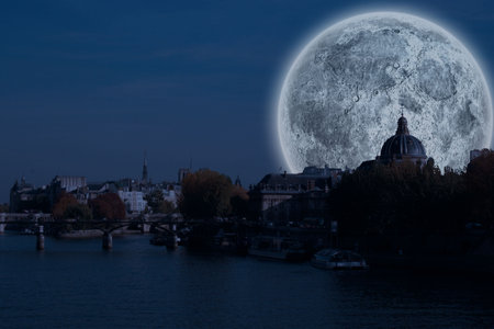 Digitally generated Large moon over river cityの写真素材
