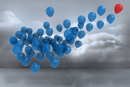 Many colourful balloons in cloudy roomの写真素材