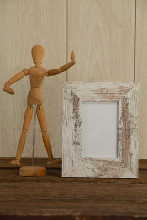 Photo frame and camera on table, Close-upの写真素材