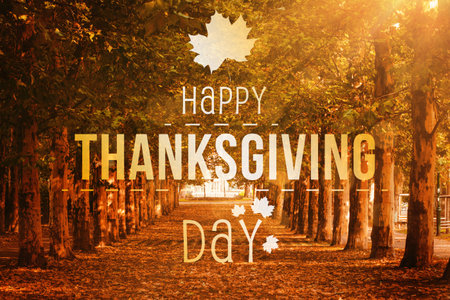 Digitally generated image of Happy Thanksgiving Day text against treesの写真素材