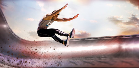 Full length of male athlete long jumping against sky in stadium