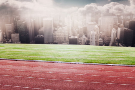 Running track in front of cityの写真素材