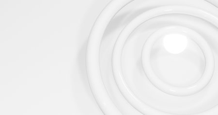 Image of multiple white 3d circles spinning in formation in hypnotic motion in seamless loop on white background. Colour and movement concept digitally generated image.の写真素材