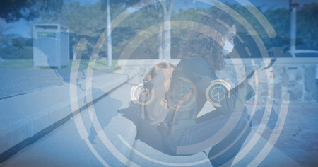 Digital illustration of a woman wearing a face mask, sitting on stairs, using a smartphone over a scope scanning in the background. Medicine public health pandemic coronavirus Covid 19 outbreak concept digital composite.の写真素材