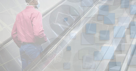 Digital illustration of a man wearing a face mask, walking up the stairs over technological icons in the background. Medicine public health pandemic coronavirus Covid 19 outbreak concept digital composite.の写真素材