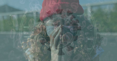 Digital illustration of macro Covid-19 cells floating over a woman wearing a face mask, sneezing....
