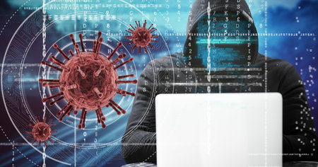 Digital illustration of macro Covid-19 cells floating, data processing over a man wearing a hoodie and a face mask with data on it, using lapto. Coronavirus Covid-19 pandemic concept digital compositeの写真素材