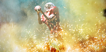 American Football Player against splashing of powderの写真素材