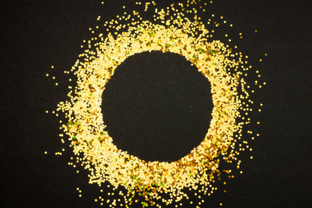 Composition of circle of gold spots on gray background. Retail, shopping and black friday concept.の写真素材