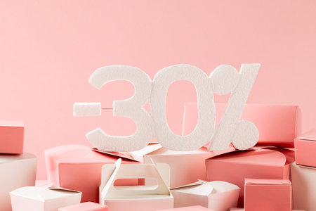 Composition of -30 percent with boxes on pink background. Retail, shopping and black friday concept.の写真素材