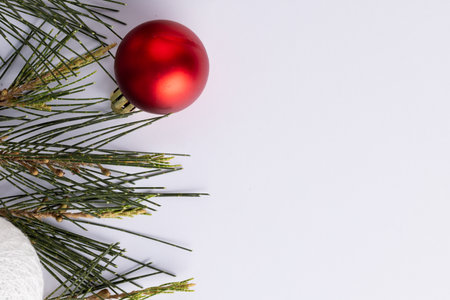 Image of christmas decorations with baubles and copy space on white background. Christmas, tradition and celebration concept.の写真素材