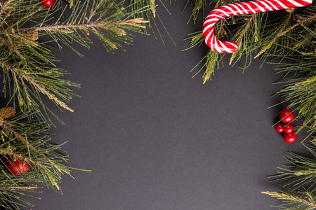 Image of christmas decoration and copy space on black background. Christmas, tradition and...