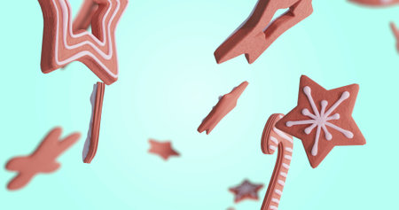 Image of gingerbread falling at christmas over white background. Christmas, tradition and digital interface concept digitally generated image.の写真素材