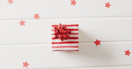 Image of christmas gift with christmas decoration and copy space on white background. Christmas, tradition and celebration concept.の写真素材