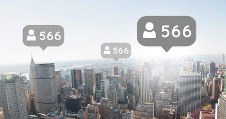 Image of social media reactions over cityscape. Social media, communication, connections, global network and new technology concept digitally generated video.の写真素材