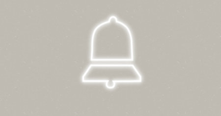Composite of illuminated digital notification bell icon against white background, copy space. Social media, information, reminder, symbol and technology concept.の写真素材