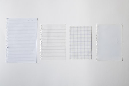 White pieces of notebook with copy space on white background. Abstract paper texture background and communication concept.の写真素材