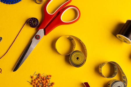 Composition of sewing equipment on yellow background with copy space. National craft month, sewing,...