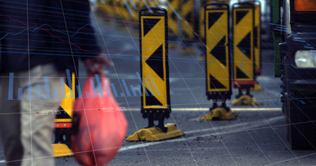 Image of statistics and data processing over man using computer and city street. Global business finance stock market and technology concept digitally generated image.の写真素材