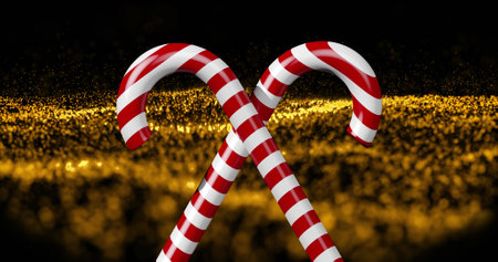 Image of christmas candies on black and golden glitter background. christmas, tradition and celebration concept digitally generated image.の写真素材