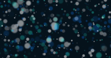 Image of light spots on black background. Christmas, tradition and celebration concept digitally...
