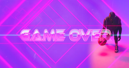 Composite of game over text with pink lines and bald african american player dribbling basketball. Copy space, the end, sport, competition, illustration, glowing, shape and abstract concept.の写真素材