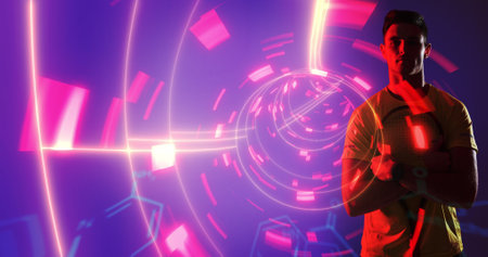 Confident caucasian sportsman with neon chemical structure and abstract design in background. Digital composite, soccer, copy space, sport, computer, abstract, chemistry, success.の写真素材