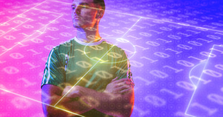 Confident caucasian player with arms crossed over neon soccer field and binary coding. Computer graphic, copy space, digital composite, soccer, design, athlete, competitive sport.の写真素材
