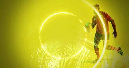 Circles and plants over african american rugby player with ball running on yellow background. Illuminated, copy space, composite, sport, competition, shape, nature, playing, match and abstract.の写真素材