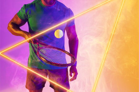 Midsection of african american male player bouncing ball with racket by illuminated triangle. Copy space, composite, sport, tennis, hand, shape, competition, playing, match and abstract concept.の写真素材