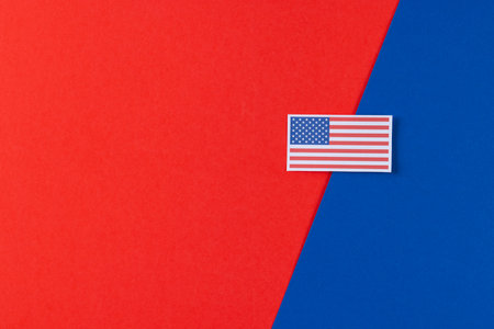 High angle view of flag of united states of america with copy space on red and blue background. American patriotism, independence day and tradition concept.の写真素材