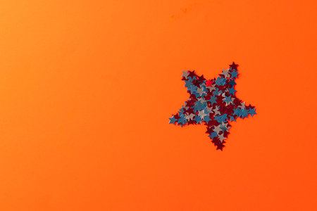 Star formed with red, blue and white stars of flag of united states of america with copy space. American patriotism, independence day and tradition concept.の写真素材