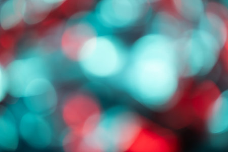 Close up of shiny multi coloured bokeh background with copy space. Colour, texture and light.の写真素材