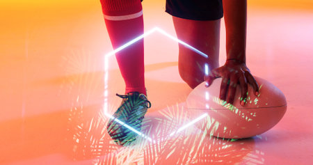 Illuminated hexagon and plants over low section of caucasian female player with rugby ball on floor. Copy space, composite, sport, competition, shape, nature, playing, match, hand, leg, abstract.の写真素材