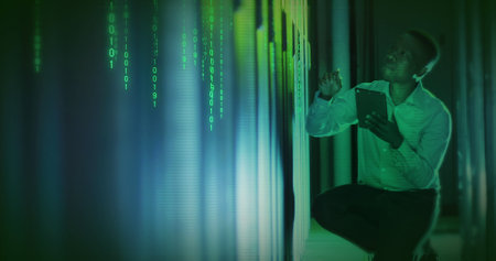 Composition of data processing over african american businessman using tablet in server room....