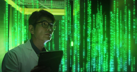 Composition of data processing over asian businessman using tablet in server room. Technology, computing and online security concept digitally generated image.の写真素材