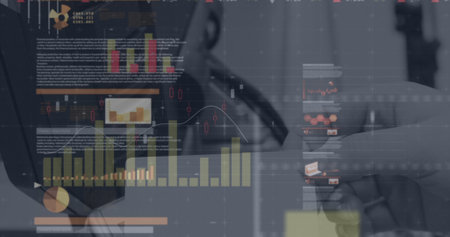 Statistical data processing against close up of person making payment using credit card. wireless...