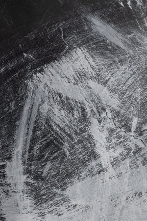 Close up of white paint on black background with copy space. Abstract background, pattern and colour.の写真素材