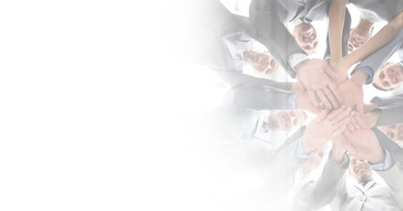 Composition of smiling business people stacking hands with copy space. business, finances, success...