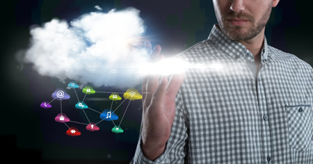 Composition of digital online icons floating with cloud over businessman's hand. global...