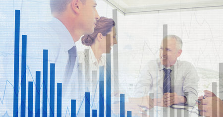 Composition of happy diverse business team in meeting over interface with graph. global business communication and digital interface concept digitally generated image.の写真素材