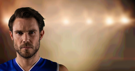 Composition of portrait of male basketball player with spotlights and copy space. sport and competition concept digitally generated image.の写真素材