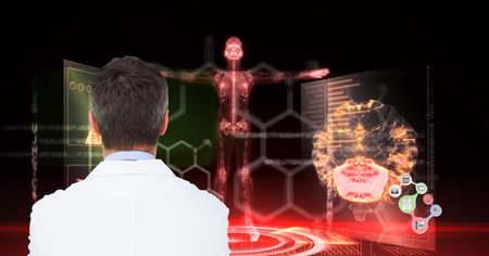 Composition on male doctor over screen with digital human body and medical data processing. global...